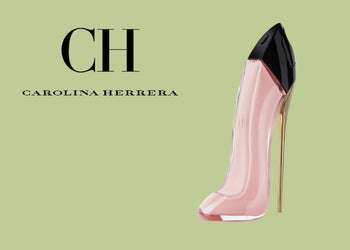 Carolina Herrera Good Girl Blush perfume in a pink stiletto-shaped bottle with black and gold accents, displayed against a pale green backdrop with CH logo. 1